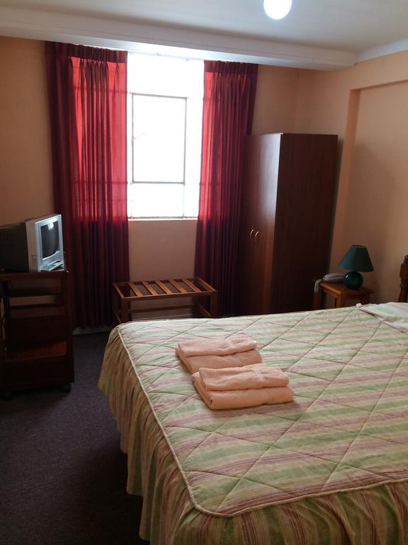 Posada Don Giorgio Puno Chambre photo