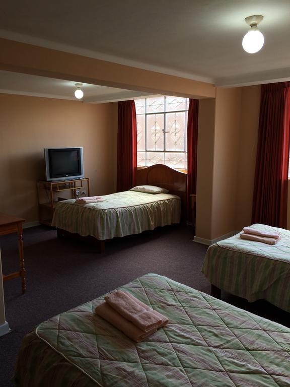 Posada Don Giorgio Puno Chambre photo